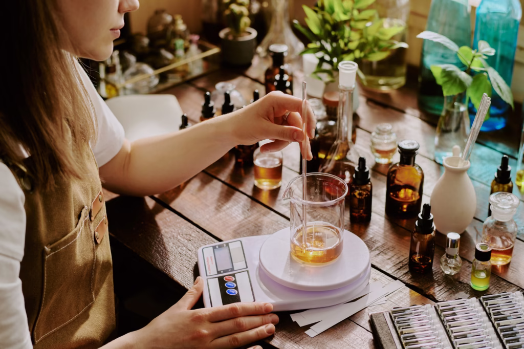 Young Perfumer Blending Essential Oils